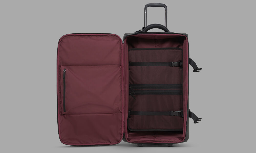 Lost In Berlin Exile Duffle with Wheels 72cm Black | Lipault France
