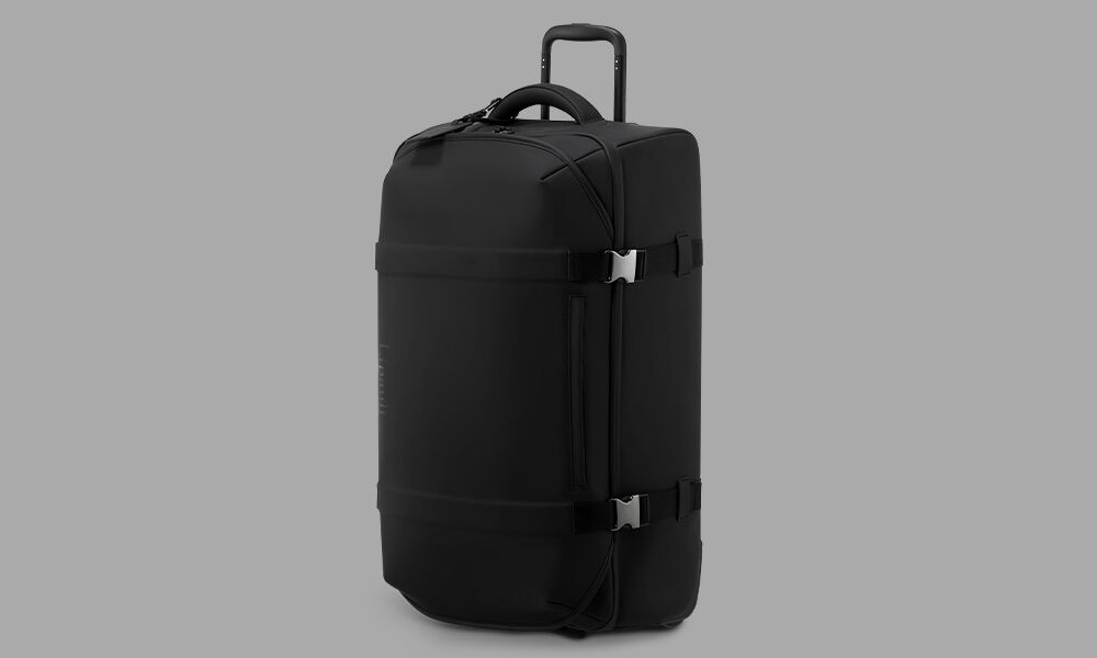 Lost In Berlin Exile Duffle with Wheels 72cm Black | Lipault France